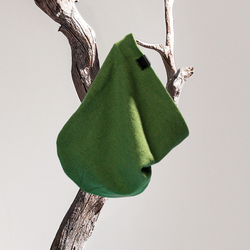 Presentational image of a green beanie